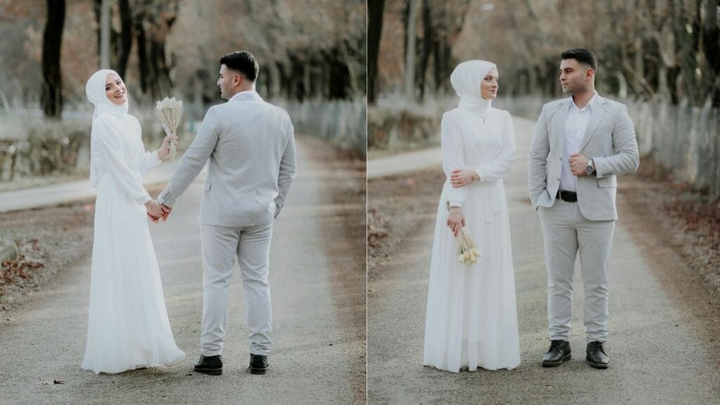 Couple in wedding attire, with the bride in a white dress and groom in a gray suit, showcasing a modern wedding look