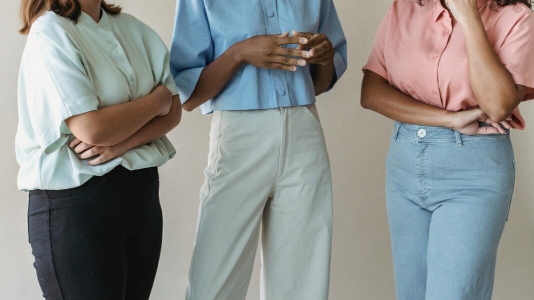 Stylish women wearing colorful shirts and XL pants, showcasing plus-size fashion trends