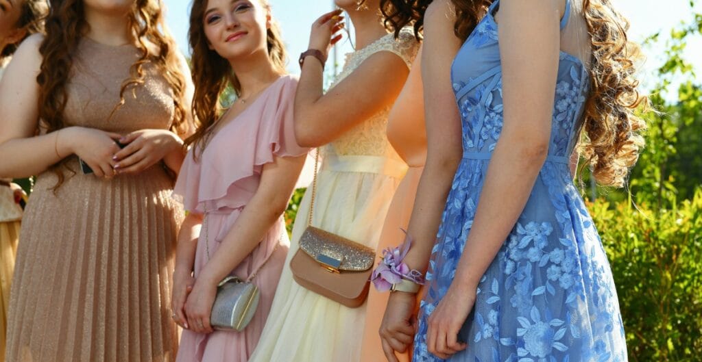 “A diverse group of plus-size models wearing long-sleeve formal gowns, highlighting body-shape-aware styling tips such as waist emphasis, neckline balance, and sleeve choices for flattering silhouettes.”
