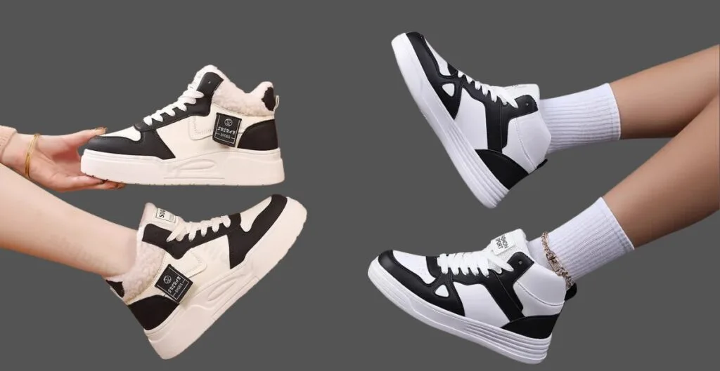 "Close-up of sleek winter sneakers with insulated lining and chunky rubber sole on a snowy ground."
