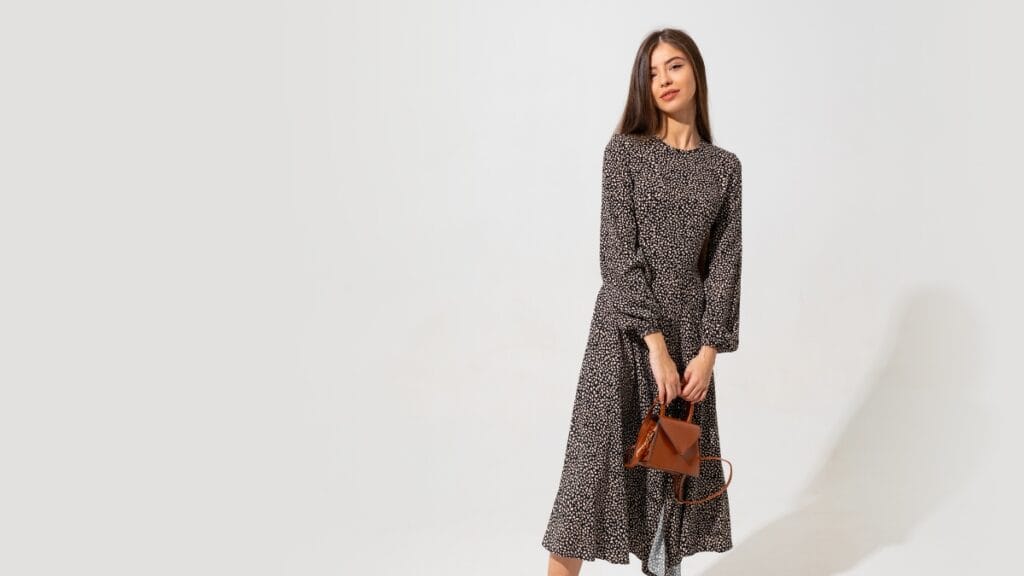 Casual long sleeve midi dress with a stylish belt, perfect for everyday wear.