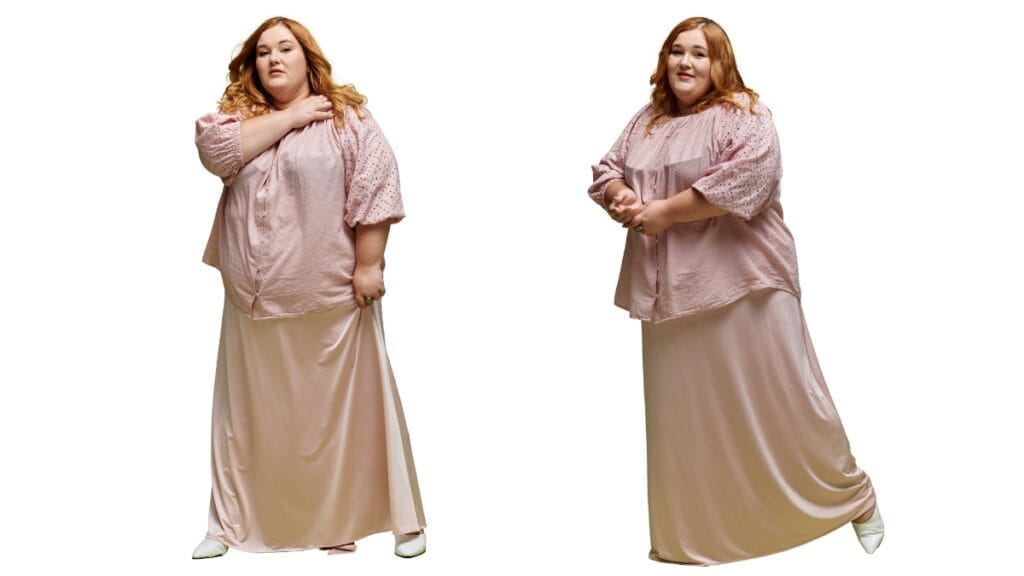 Plus satin dress in a soft blush pink color, featuring a loose-fitting top with short sleeves and a long skirt, worn by a curvy model.