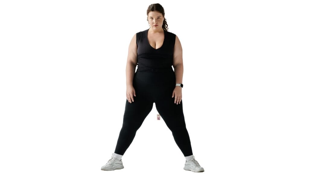 Woman confidently posing in womens plus size joggers, showing comfort and style