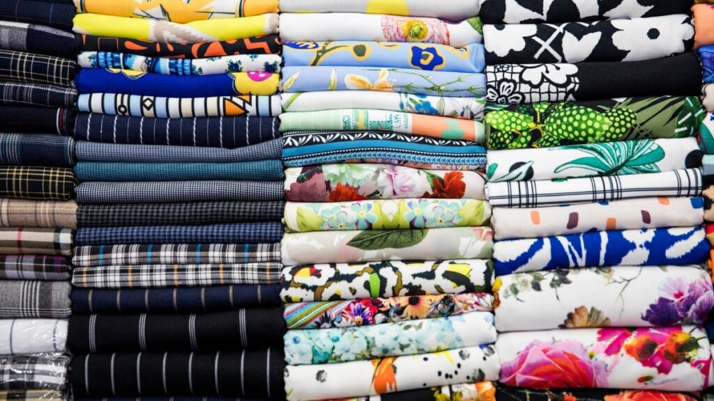 Different types of cotton materials with pictures showcasing a variety of vibrant fabrics and patterns