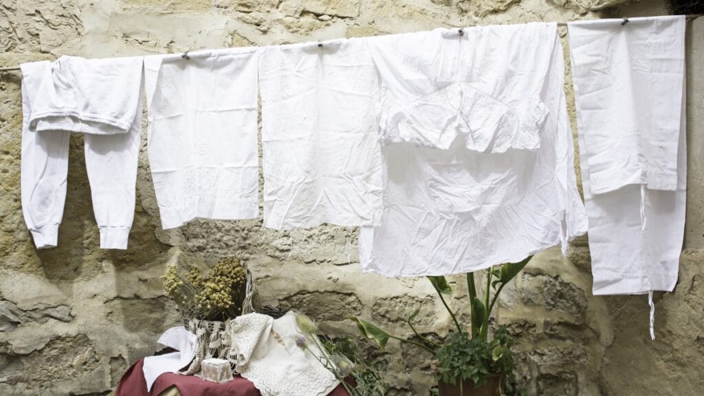 How to wash linen: A basket with neatly folded linen clothes after washing
