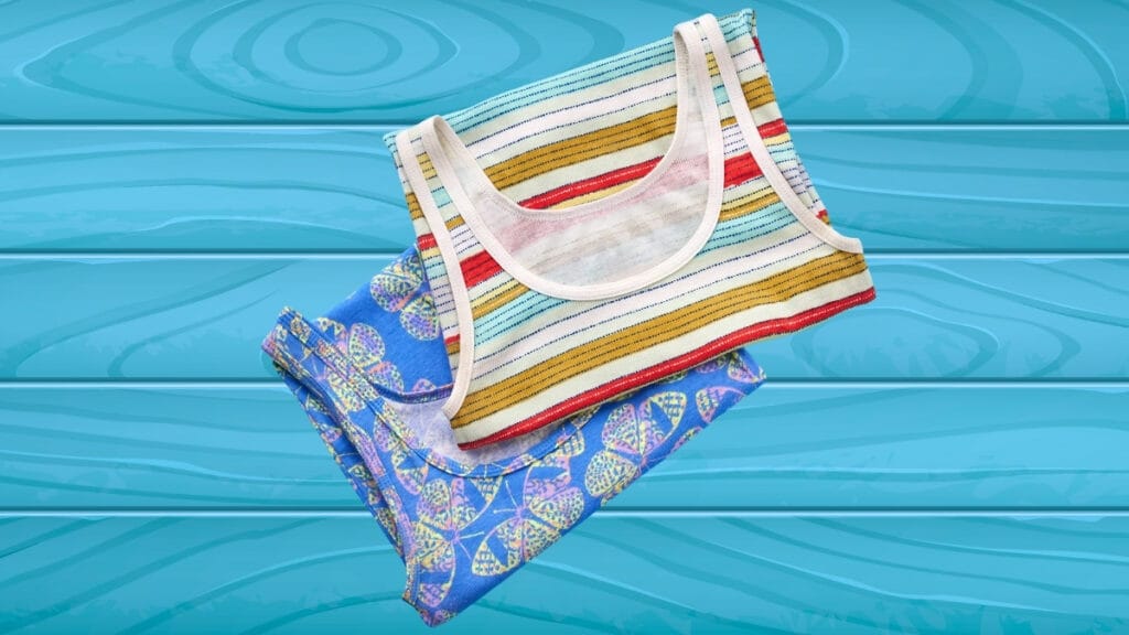 Swim trunk fabric with striped and floral patterns on a blue background