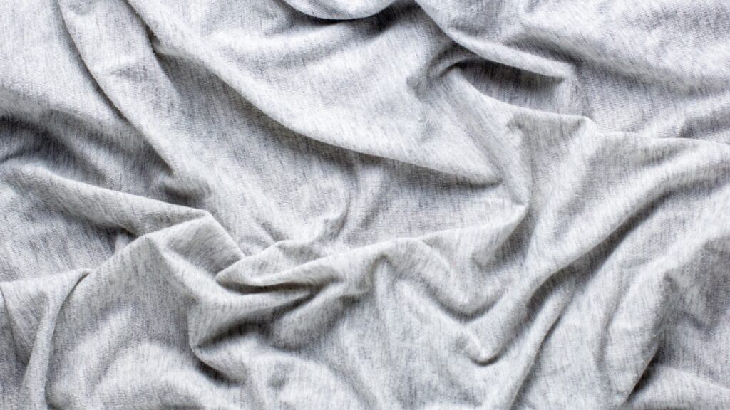 Wrinkled sweatshirt fabric, showcasing the texture and softness of the material