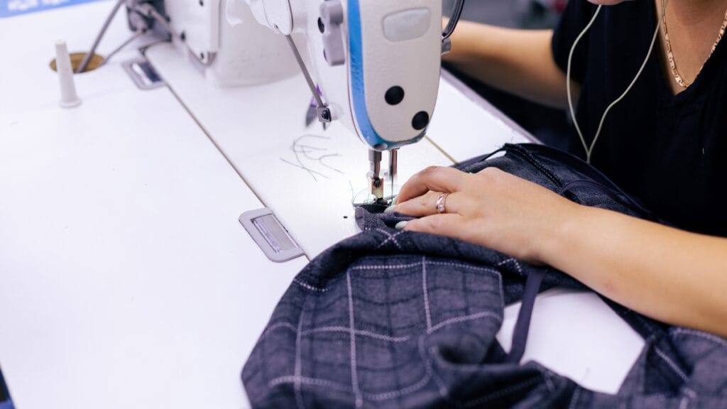 Sewing machine stitching fabric for a stylish apparel design, ideal for beginners