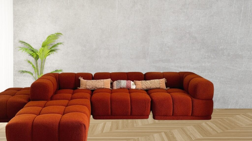 “Close-up of blue velvet fabric on a sofa, showing rich texture and soft nap.”