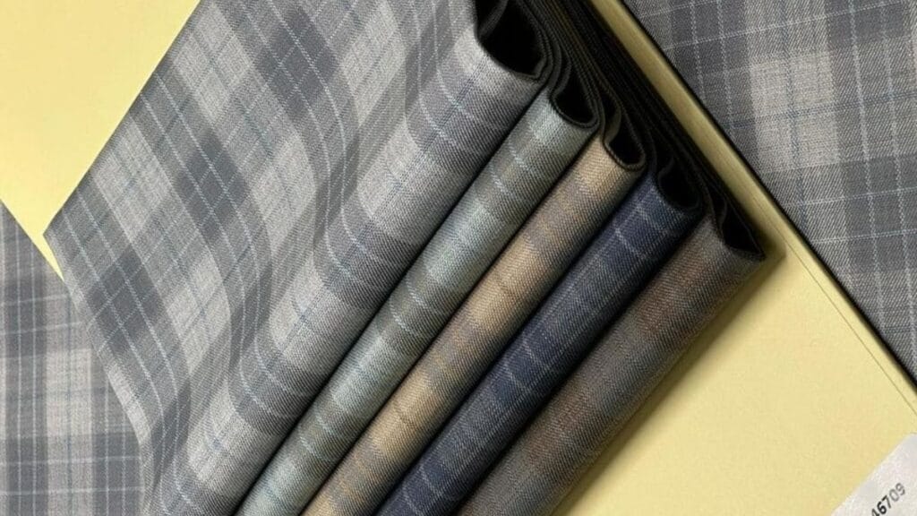 "Weave pattern of recycled textile fibers, representing paid fabric as a product of sustainable fashion trends."