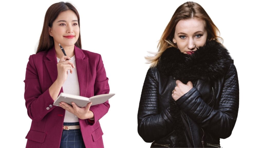 Professional woman wearing a burgundy blazer, holding a notebook and a pen, with a confident smile