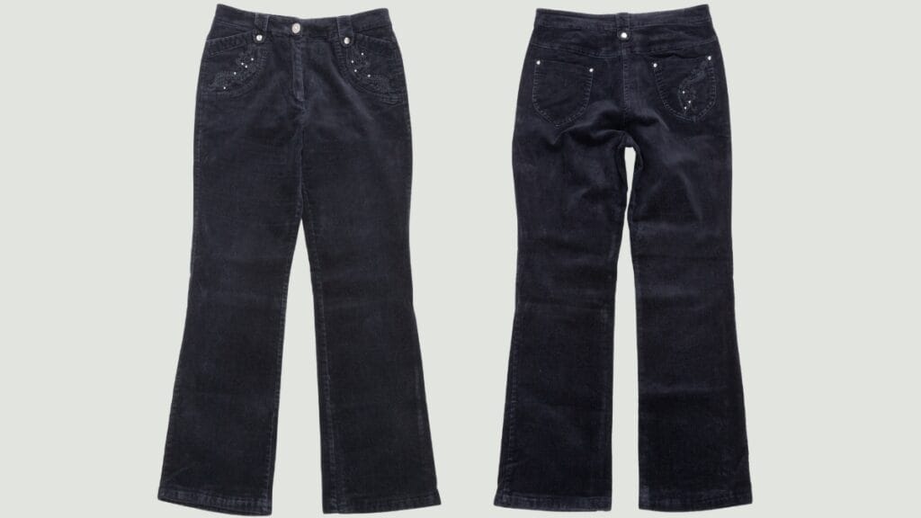 Black corduroy pants with decorative front and back types of trouser pockets