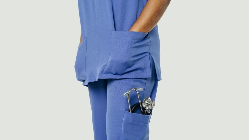 Close-up view of scrubs with side and front types of trouser pockets used by a healthcare professional