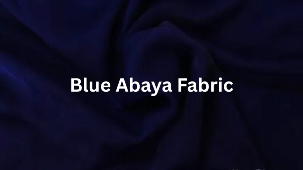 Blue Abaya Fabric — a close-up fabric image in deep blue with a soft, flowing texture, with the text “Blue Abaya Fabric” displayed across the center.