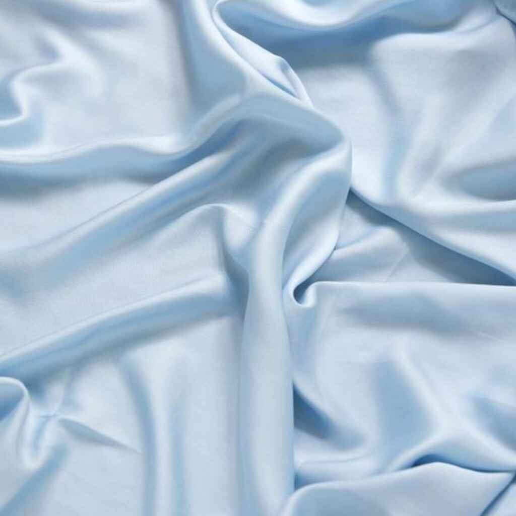 Lightweight Tencel fabric, soft and biodegradable, made from sustainably sourced wood pulp.
