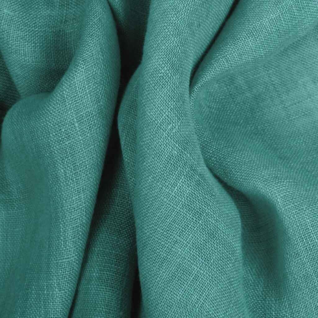 Crisp linen fabric, made from flax plants, known for durability and eco-friendliness.