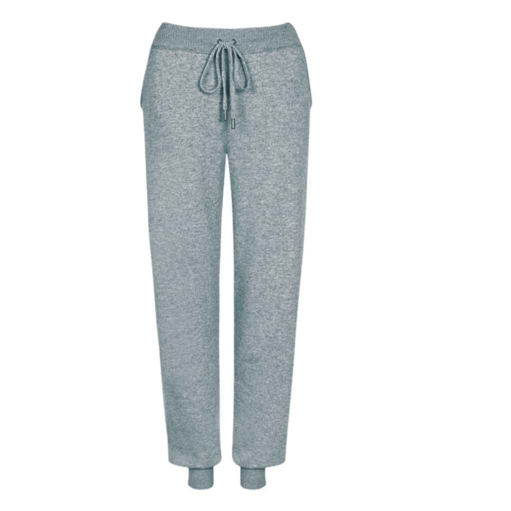 Lightweight and breathable women's performance joggers designed for active wear. Featuring moisture-wicking fabric, a slim fit, and tapered legs for optimal movement during workouts or outdoor activities.