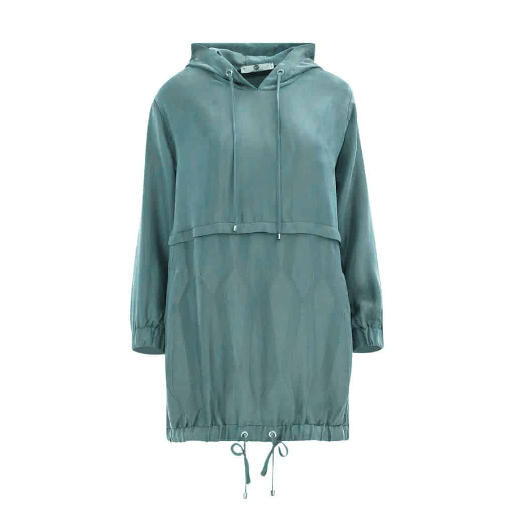 A comfortable tunic hoodie with side slits and an oversized hood.
