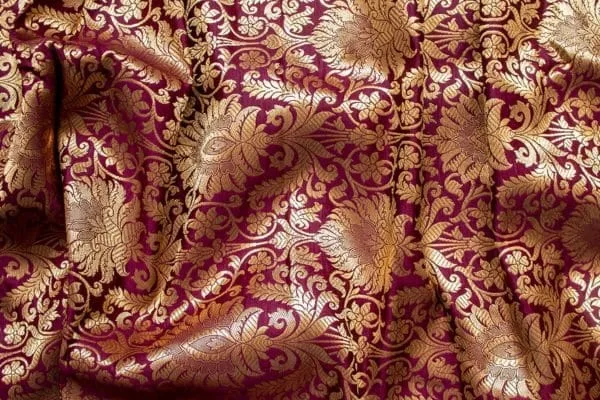 infographic image of show the clothes of zari brocade fabric