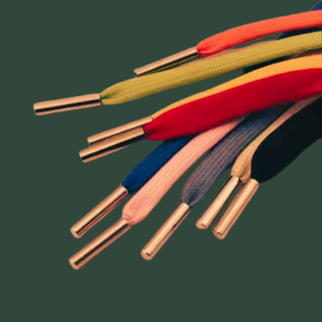 Hoodie metal tips are the small metallic ends that are attached to the drawstrings of hoodies.
