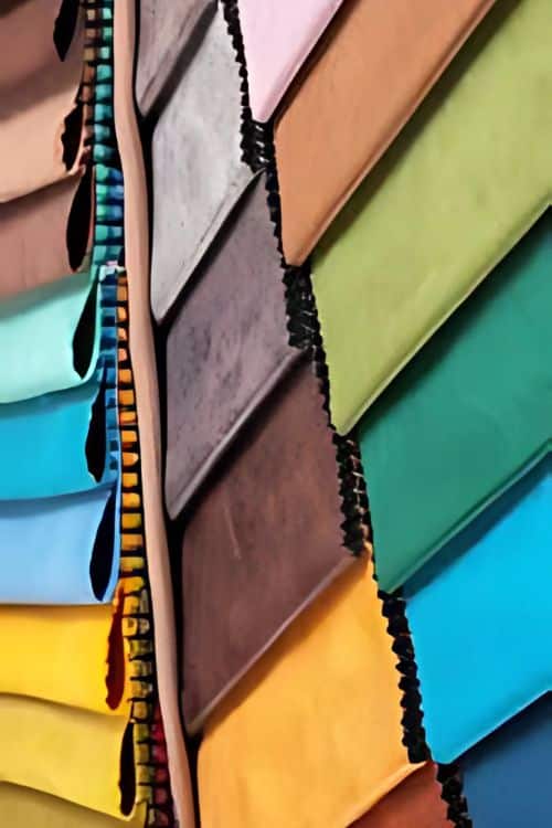 Variety of fabric options, including organic cotton and recycled polyester, offered by a fashion wear supplier in Netherlands.