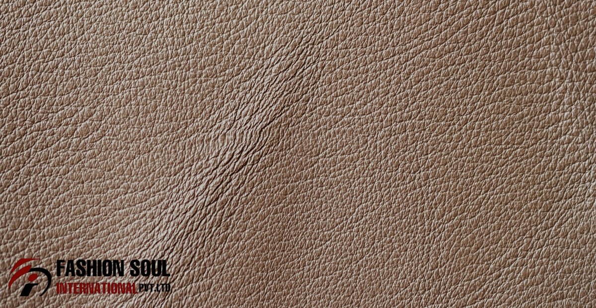 Close-up of textured Genuine Leather.