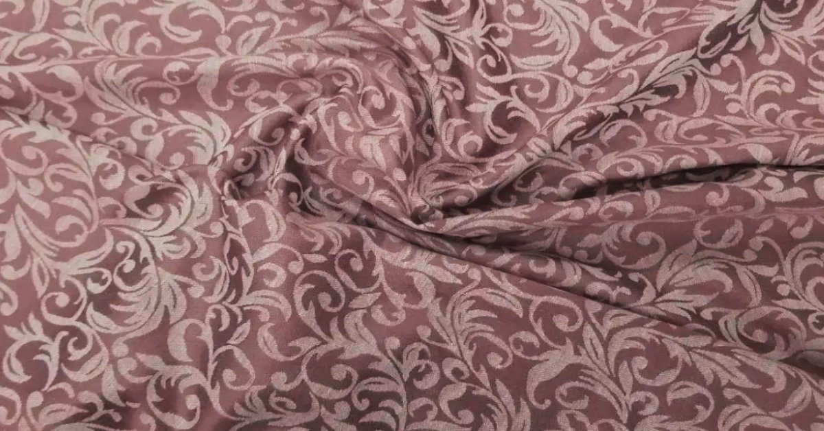 Elegant jacquard fabric with intricate woven patterns, showcasing a luxurious and stylish texture.