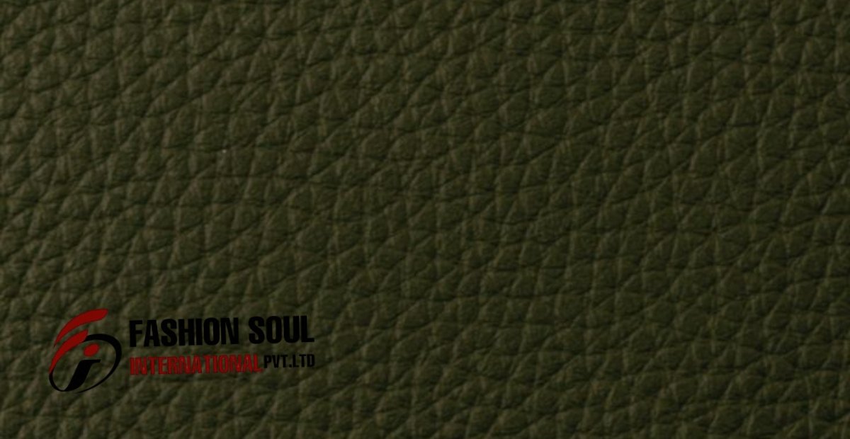 Close-up of bonded leather material with a textured surface in a dark green shade.