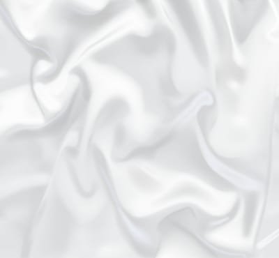 Shiny white silk fabric with soft folds and texture.