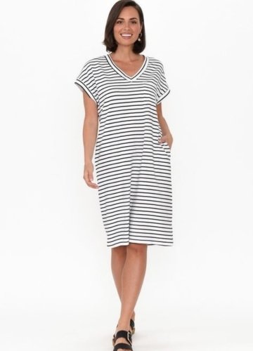A woman modeling a striped tee dress with a V-neckline, short sleeves, and side pockets.