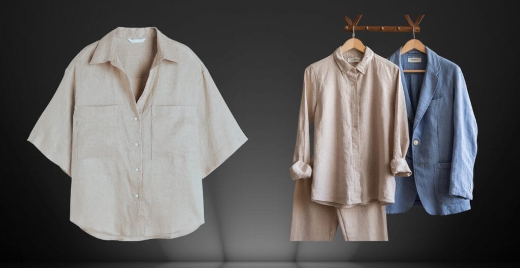 A collection of three linen clothing pieces: a beige short-sleeve button-up shirt hanging on a wall, and a cream-colored long-sleeve shirt along with a blue blazer hanging on a wooden rack against a dark background.