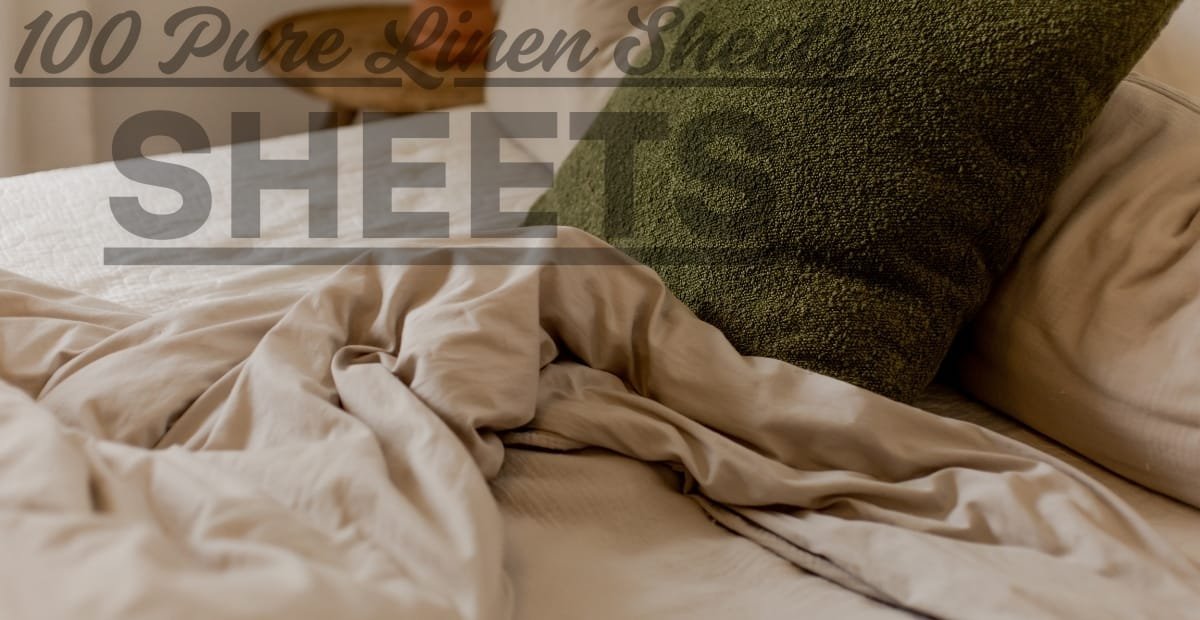 Close-up of a neatly arranged bed with a beige linen sheet and pillow, featuring a dark green textured pillow in the background. Overlaid text reads "100% Pure Linen Sheet."