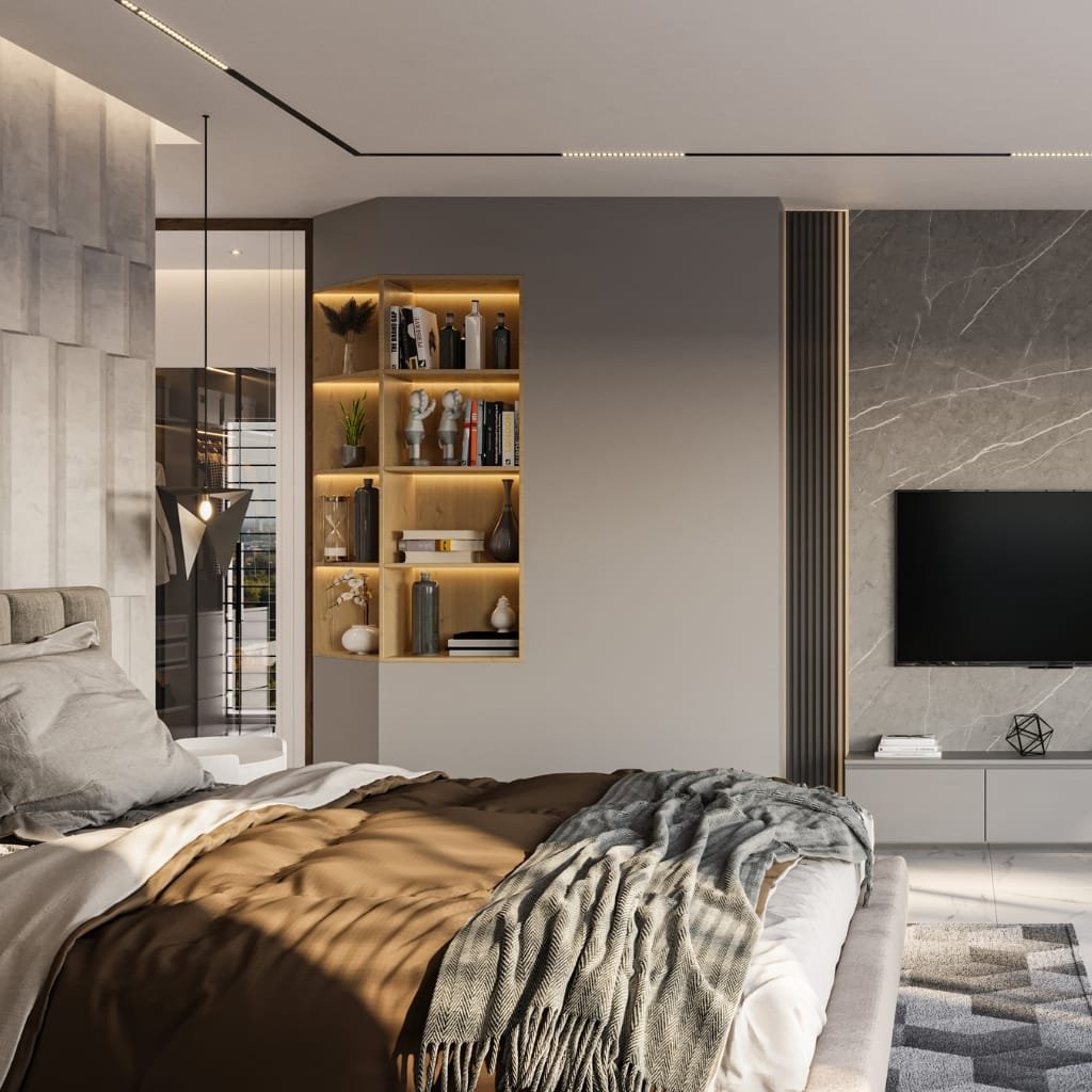 A modern, stylish bedroom featuring a bed with beige and brown bedding, a decorative throw blanket, and a textured wall with a mounted flat-screen TV. There's a built-in wooden niche with ambient lighting displaying decorative vases and books, and a glass door leading to a balcony with a staircase visible outside.