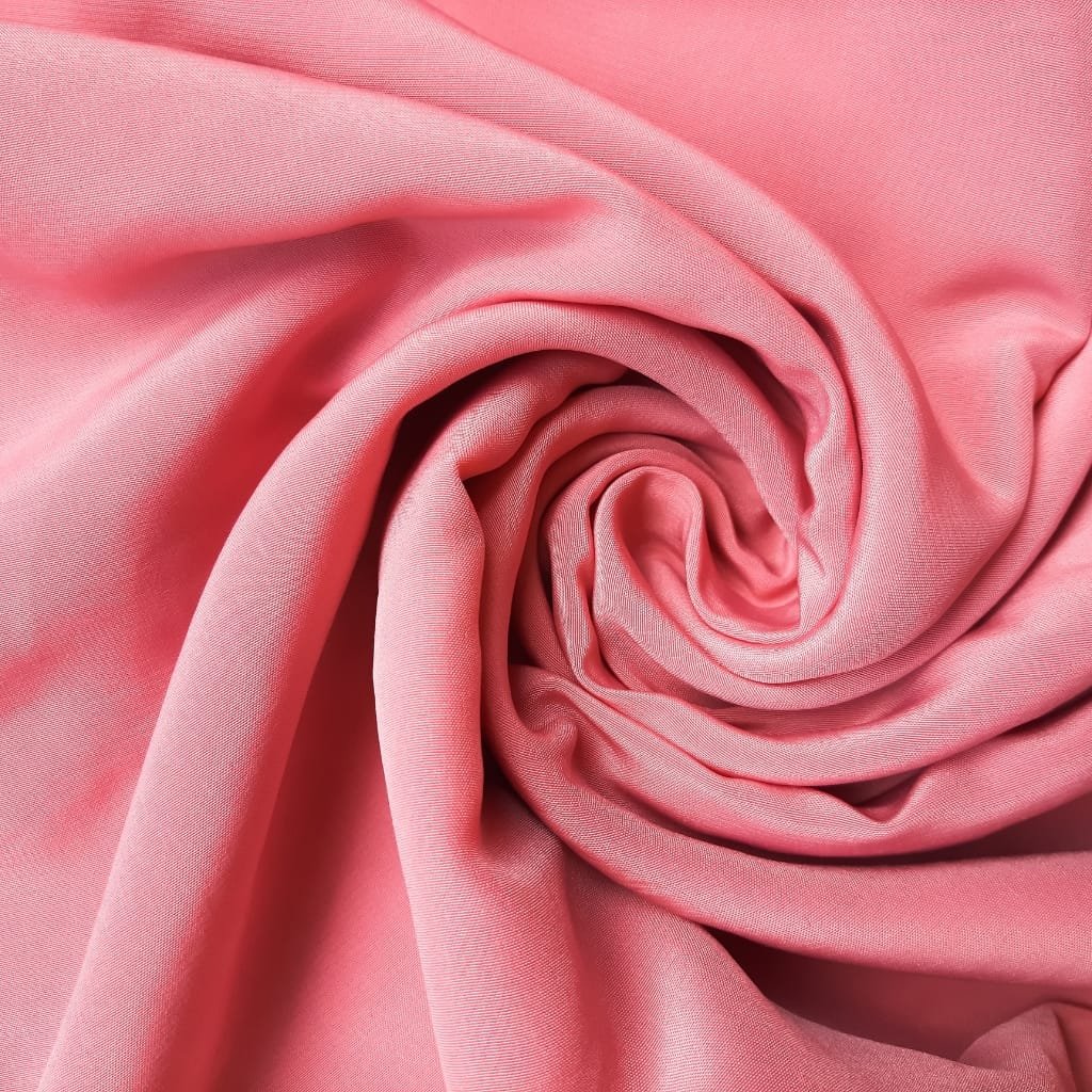 Microscopic view of fabric weave, showing fibers and texture details.