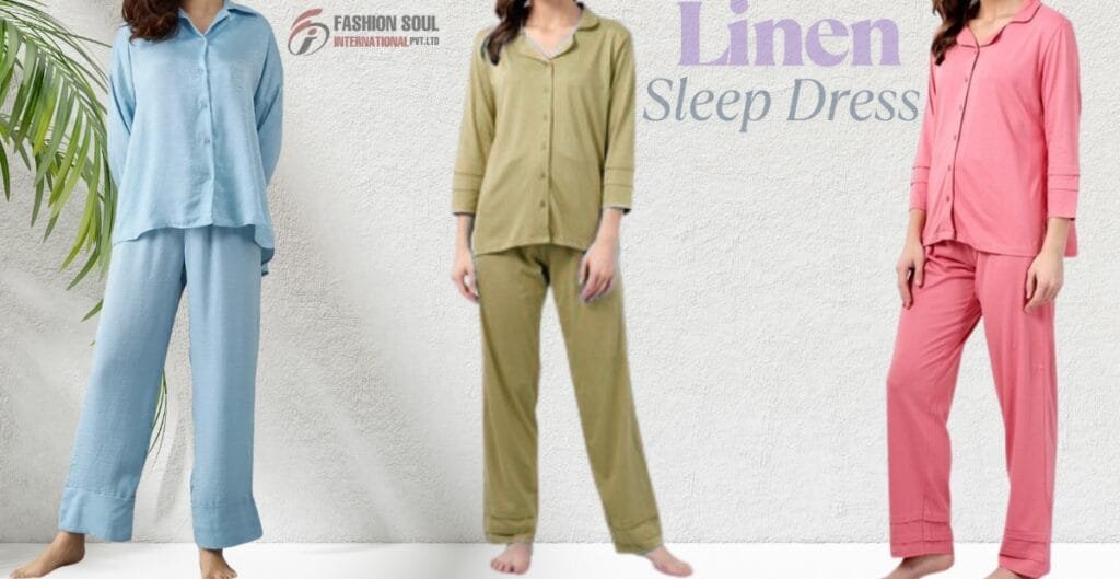 Three women standing side by side each wearing different colored linen sleepwear sets in pastel shades: light blue, olive green, and pink, against a neutral textured background with a plant on the side.