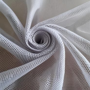 White, lightweight polyester mesh fabric with a grid-like, perforated pattern, arranged in a spiral.