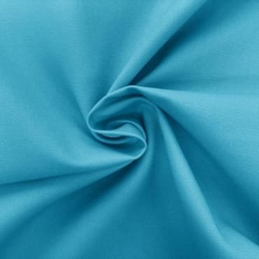 A close-up of light blue polyester jersey fabric, gently twisted to show its smooth texture and slight sheen.