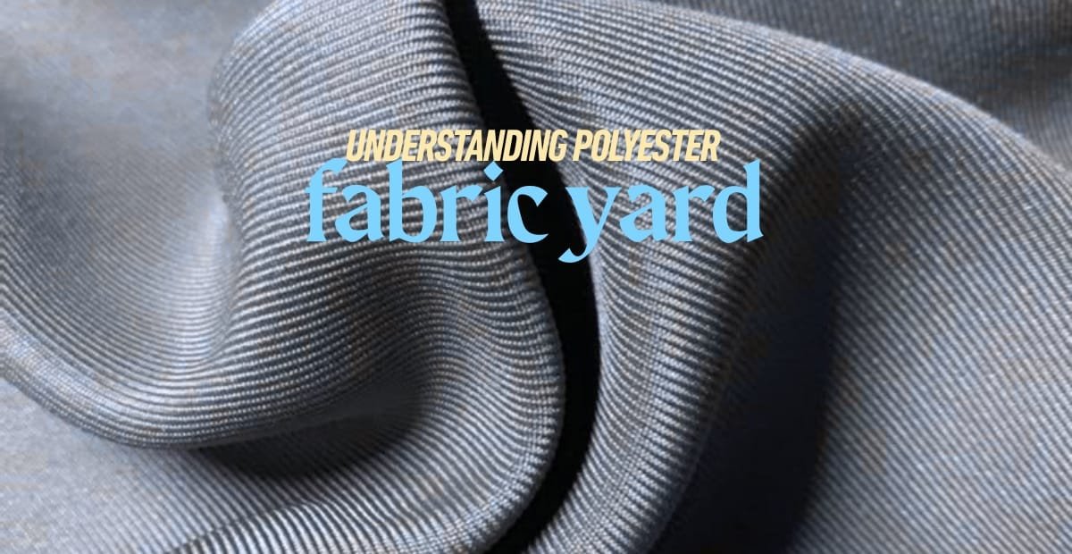 Close-up of a shiny, smooth polyester fabric with text overlay that reads "Understanding Polyester Fabric Yard and Best Uses in Various Projects."
