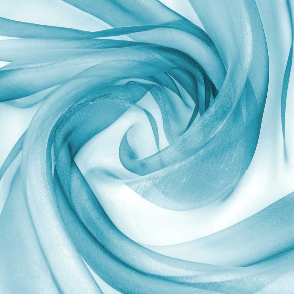 A close-up image of sheer, lightweight organza fabric in soft shades of blue, gently swirling in a spiral pattern that highlights its delicate, translucent texture.