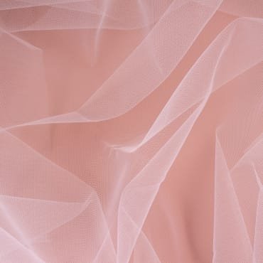 Soft pink nylon chiffon fabric with delicate folds and a semi-transparent appearance.