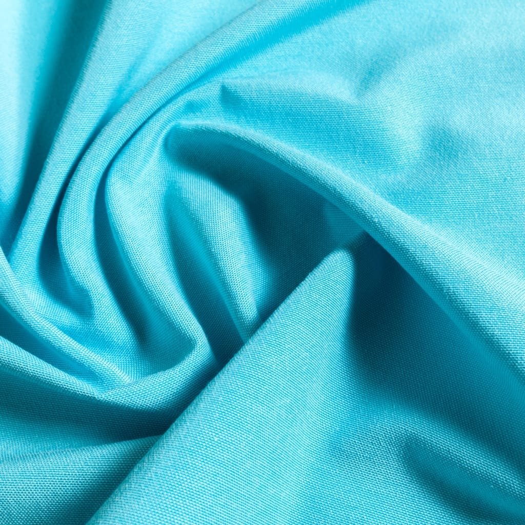 Close-up image of light blue cotton spandex fabric with a smooth, slightly shiny surface, showing its soft texture and gentle folds.