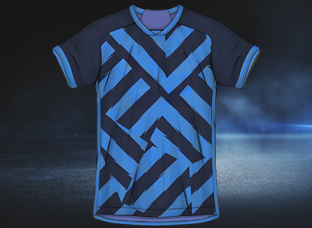 A blue and black sublimation polo shirt featuring a geometric zigzag pattern, displayed against a dark background.