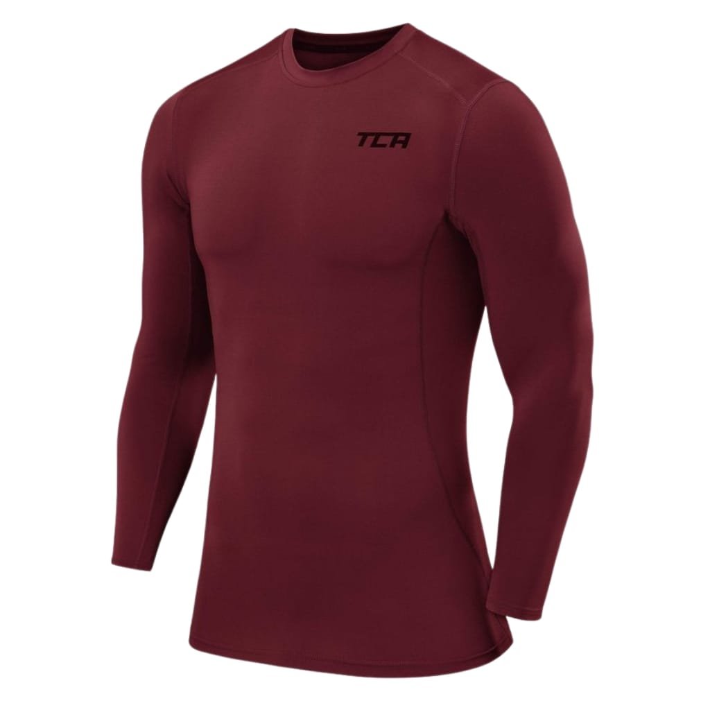 A long-sleeve, fitted maroon athletic base layer shirt with black "TCA" logo on the upper left chest, designed for moisture-wicking performance.