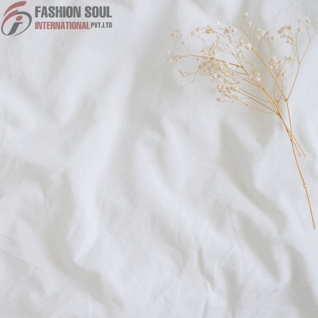  A crumpled white paper background with a delicate dried flower arrangement on the right side and the logo of "Fashion Soul International Pvt. Ltd." in the top left corner.