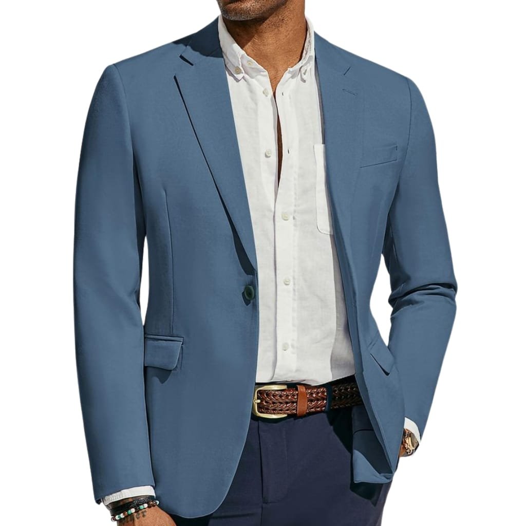 Close-up of a man wearing a navy sport coat, highlighting its tailored fit and fabric texture.