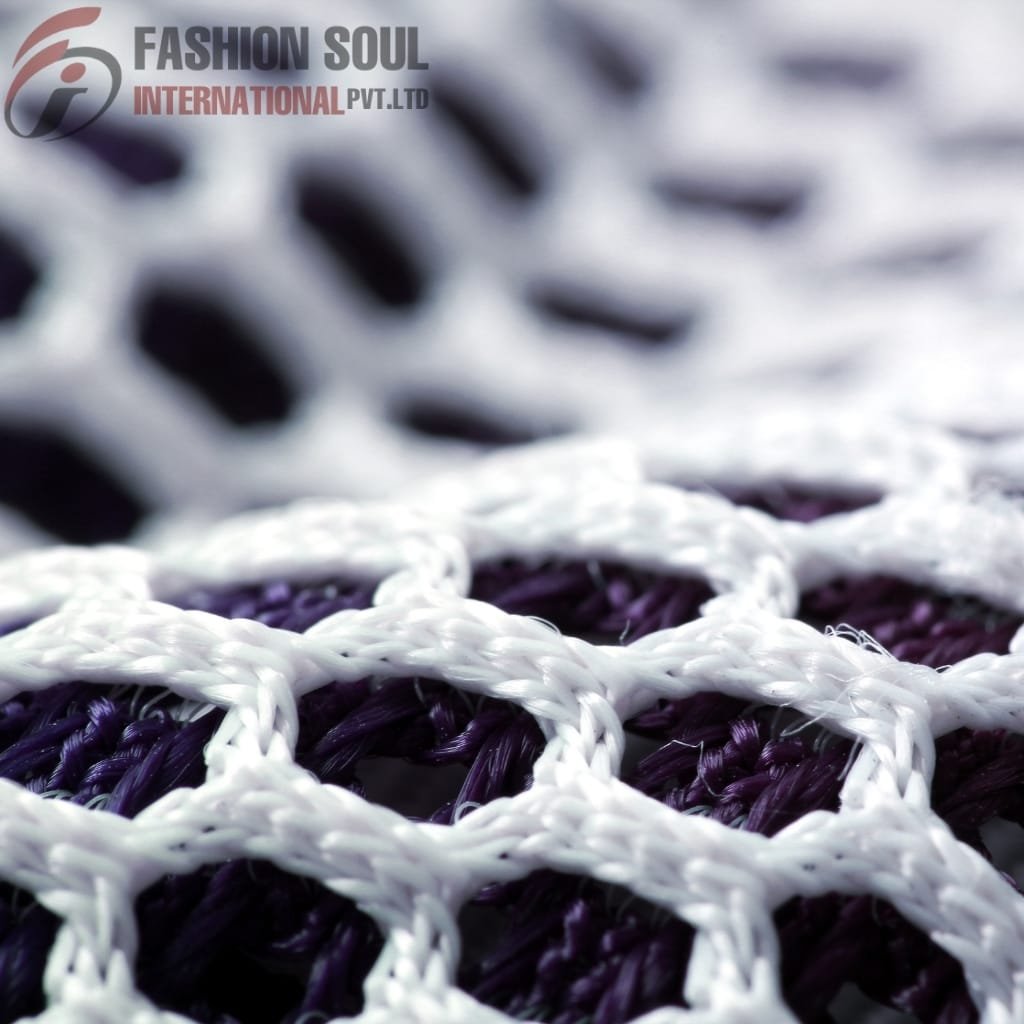 Close-up of a woven netted fabric with purple and white threads forming a grid pattern.