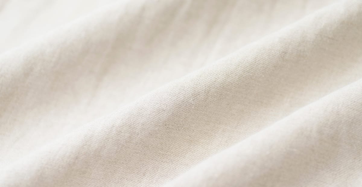 Sheer linen fabric material, lightweight and elegant, perfect for summer fashion.