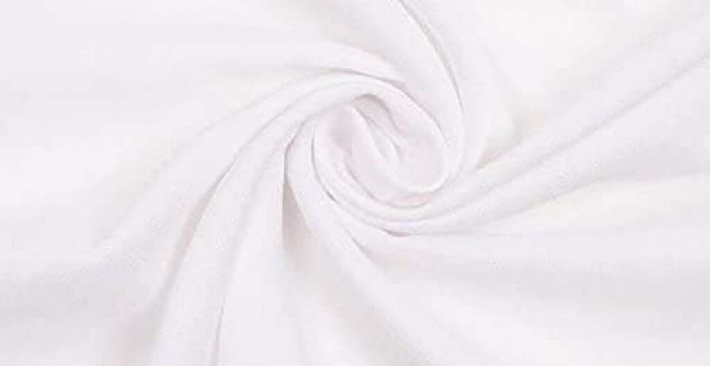 Close-up of white fabric twisted into a spiral pattern, showing smooth texture and slight stretch.