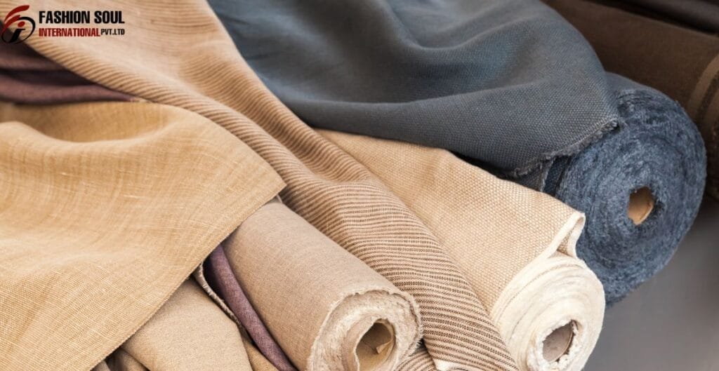 Natural fiber clothing displayed on a rack in a minimalist boutique