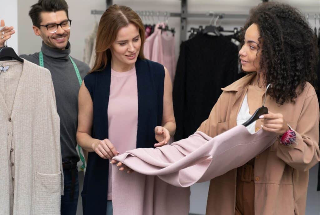 A confident woman standing tall in custom workwear apparel, symbolizing empowerment and self-expression through fashion.